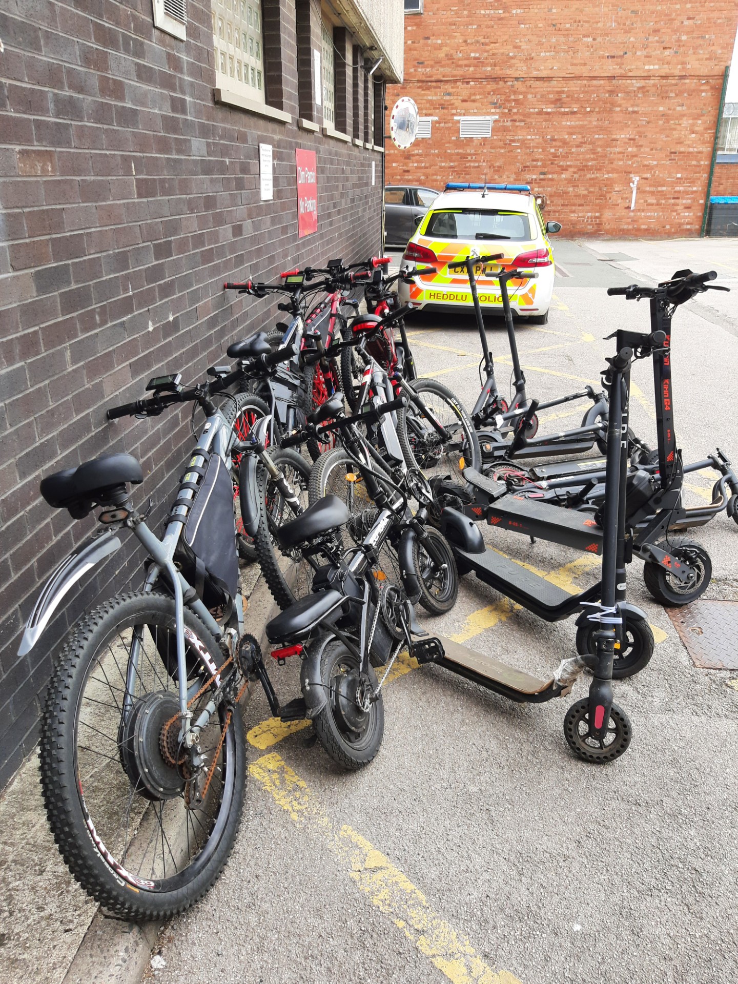 Photograph showing some of the ebikes and escooters that were seized