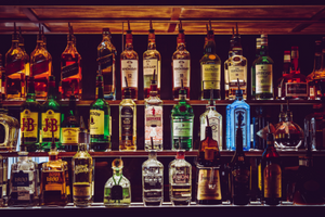 A bar stocked with alcoholic spirits