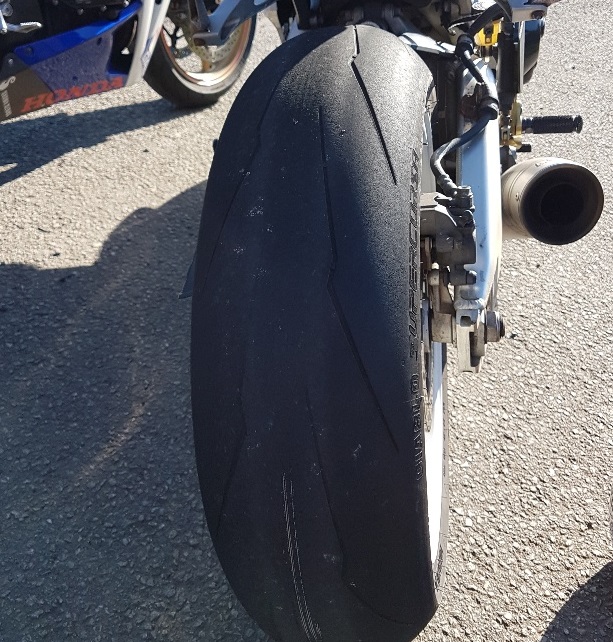 Photograph showing a defective tyre on a motorbike