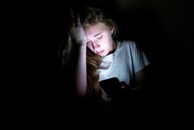 Stock image of girl on phone
