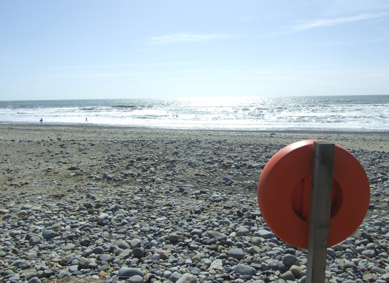 Photograph of a police car on a beach in North Wales